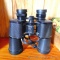 Bushnell Falcon InstFocus 10x50 binoculars with lens caps. Focus works.