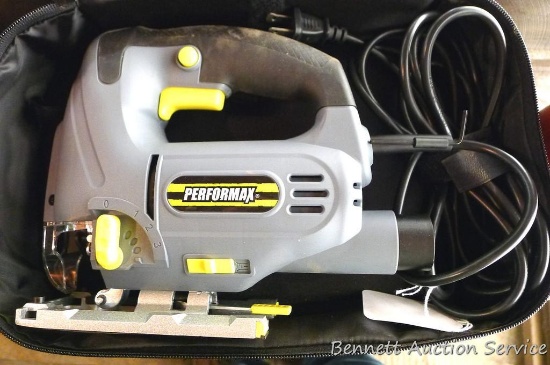 Performax variable speed jig saw in case, all appears new.