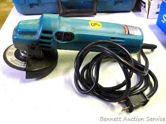 Makita 4" Disc Grinder model N9514B. Works. Comes with handle, blade changing tool and carrying