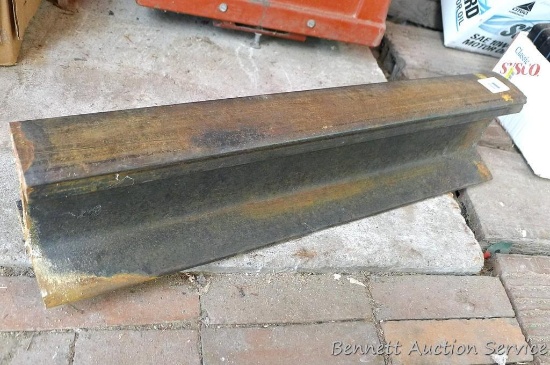 Railroad track is approx 26"x 5" and could be used as an anvil.