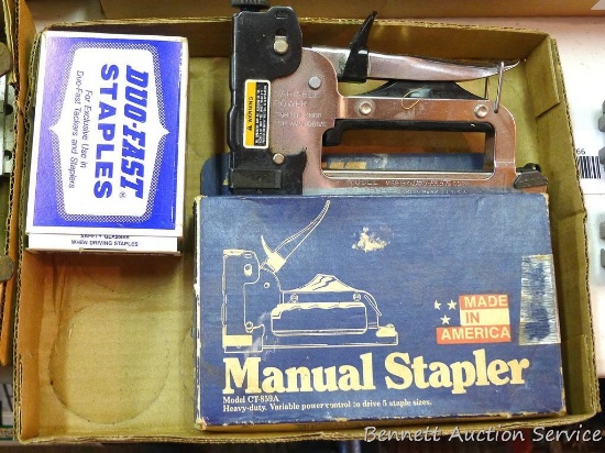 Duo-Fast Manual Stapler model CT-859A 7-1/2" x 4-1/2"; partial box of 5/16" staples.