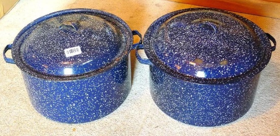 Two speckled enameled canners both have racks. Lid is a little small for one, both are approx 8"x
