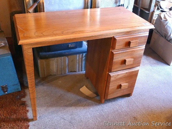 Little sewing table has three dovetailed drawers. Measures 32" wide x 25" high x 16" deep. Table is