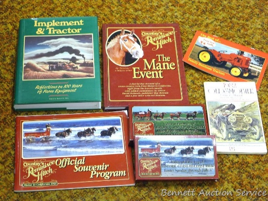 Books including Implement and Tractor, 1982 Oldsmobile, Tractor Talk, and Country's Reminisce Hitch