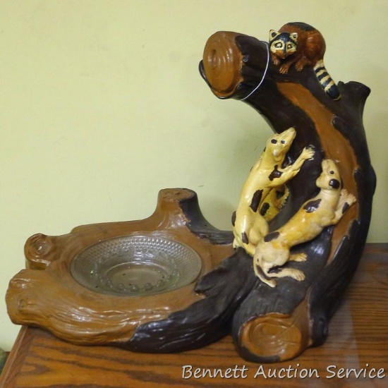 Funky display ashtray holder shows dogs treeing a raccoon and is marked 'With Love, Linda and Bud'.