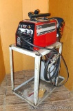 Century Professional Wire Feed Welder, includes metal rolling bench 16