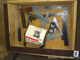 Contents in box; 2' Carpenter's square; set of 3M earmuffs; aluminum squares and more.