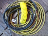 Two straight air hoses plus a self retracting hose. 24