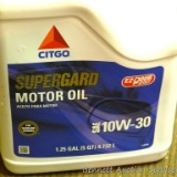 No shipping.  Five quarts Citgo super guard motor oil 10W30 NIP.