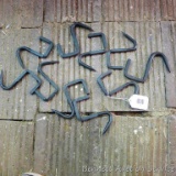10 carcass hooks, good for deer season. Can hang on your garage rafters.