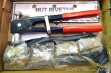 Nut riveter with nozzles & nut rivets of different sizes.