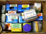 Large box filled with assortment of screws, nails, washers and more. Box is 25