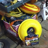 Various lengths of extension cords and 2 cord pros to keeps your cords from getting tangled. Also