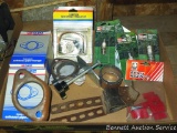 Automobile exhaust parts including hangers, flanges, spacers; Chrysler electric tune up kit;