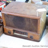 Antique radio in wooden cabinet 12