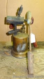 Brass blow torch with two soldering irons.