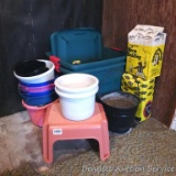 Two totes with lids, each approx. 18 gallon; step stool; six assorted buckets; a few wastebaskets;