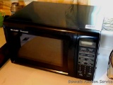 Sharp Carousel microwave in working order. Measures 18