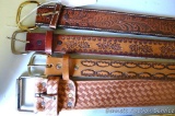 Four men's leather belts with nice designs. Belts measure 36