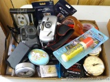Clocks, Pentax and other camera, Bostitch staples, watch bands, glass chalk, packaging tape, more.