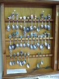 Spoon display cabinet with nice variety of spoons. Cabinet measures 20