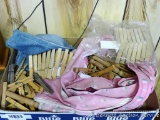 Nice quantity of wooden clothes pins, plus two bags.