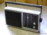 General Electric Model 7-2857A radio features AM/FM settings.