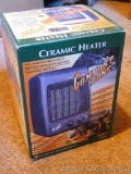 Comfort Zone ceramic heater comes with original box and stands approx. 9
