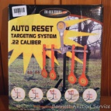Auto Reset target system for .22 caliber. Comes with original box.