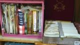 Collection of vintage and newer cookbooks, plus a box filled with recipes.