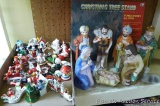 Eight piece ceramic Nativity set; Christmas tree stand; vintage wooden Christmas ornaments.