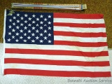 3' x 5' American flag with original box. One tear noted near bottom corner.