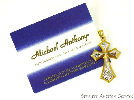 Michael Anthony cross pendant measures 1-1/4" x 1" and seller states it is 14K gold. Includes