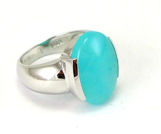 Size 7 ring with stone on top measuring 1/2' x 3/4"; is stamped 925 on the inside.