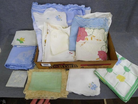 Vintage linens, some with applique and embroidery. Tablecloths, napkins & place mats.