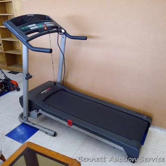 Healthrider H110i treadmill with soft track cushioning 64" x 28" x 53". Has wheels on for moving,