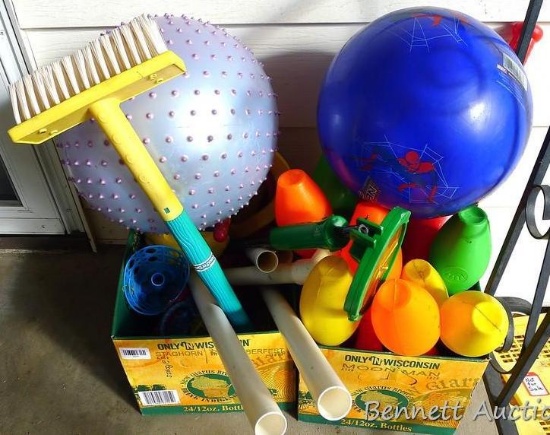 Child's bowling set, a couple of balls, Louisville slugger baseball glove, child's horseshoe set,