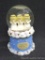 Hallmark snowglobe holds angels and stands about 7