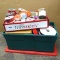 Rubbermaid tote plus other box holds ribbon, tinsel, containers, decorations, and more. Tote is
