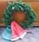 Large faux Christmas wreath, two tree stands, Christmas tree skirt. Larger tree stand is approx 2'