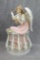 Member's Mark hand painted porcelain angel looks to be in good condition. Stands about 12