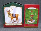 Hallmark Keepsake ornaments include The Grinch. One is wrapped in bubble, the other in original