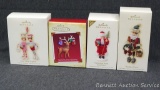 Set of 4 Halllmark Keepsake ornaments include santa, reigndeer and more; tallest box measures 6