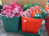 Rubbermaid and other tote hold faux poinsettas and pine boughs, more. Totes are about 16