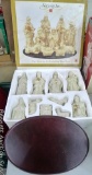 Hometown Holisays 11 piece Nativity set includes wooden base. I lookes at a few pieces and they were