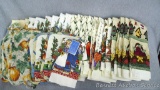 Collection of harvest themed hand towels and hot pads, most are new.