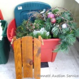 Tote comes with lid and holds faux pine, holly, and other decotations. Some pieces of arrangements