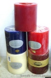 Vanilla, jasmine, cranberry, and cinnamon candles. Five candles are all about 5-1/2