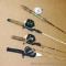 Five fishing rods and reels including a St. Croix rod Zebco 202 and Shakespeare reels. Longest pole