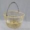 Coated wire egg basket measures 15